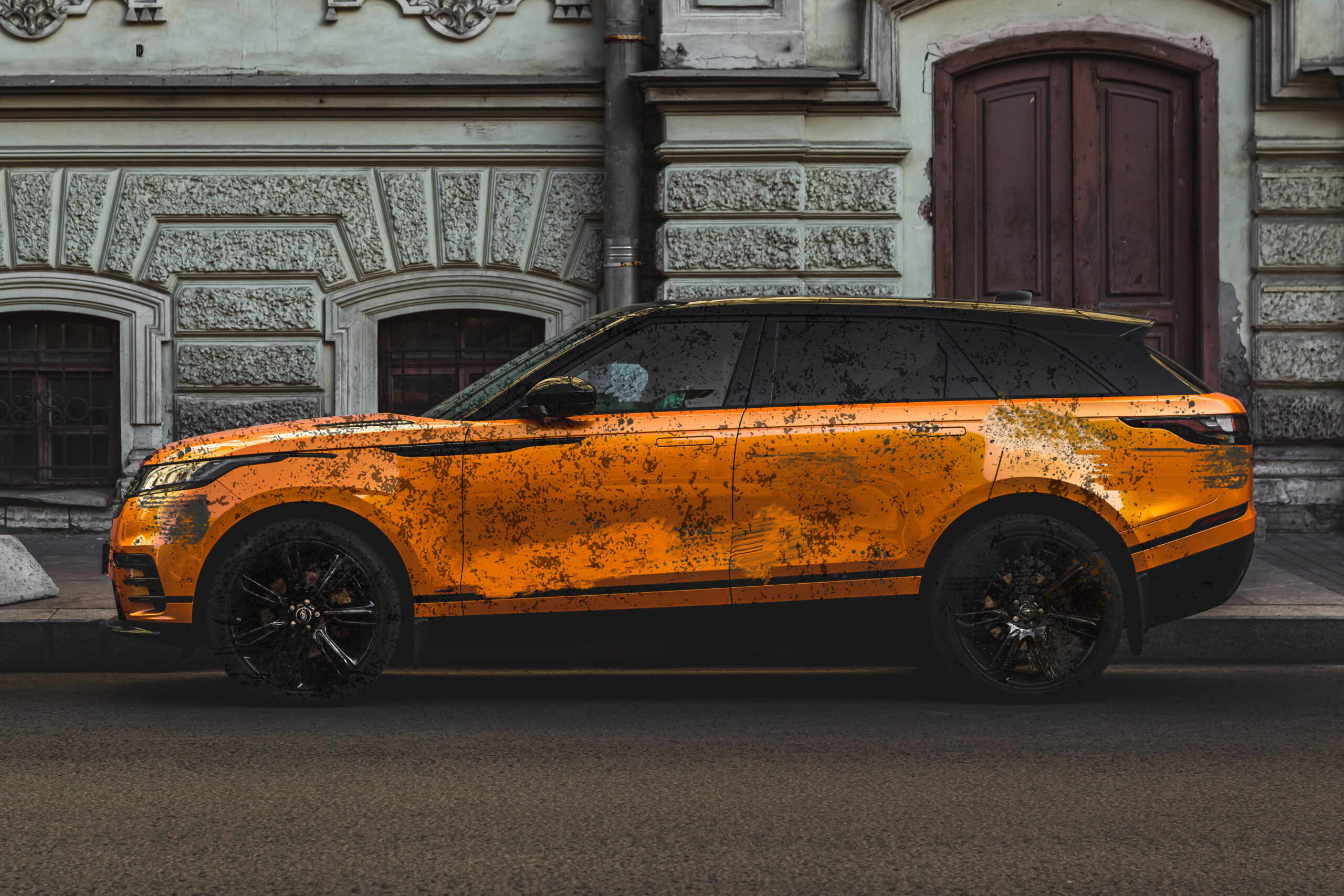 modrern-orange-car-stands-street-old-city